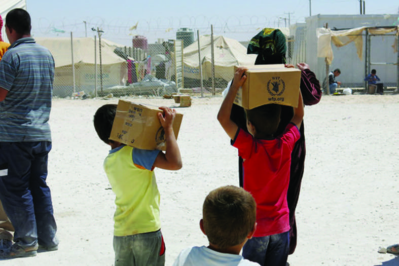 Refugees can cook dry food rations in one of 250 communal kitchens set up by UNHCR in Zaatari camp.