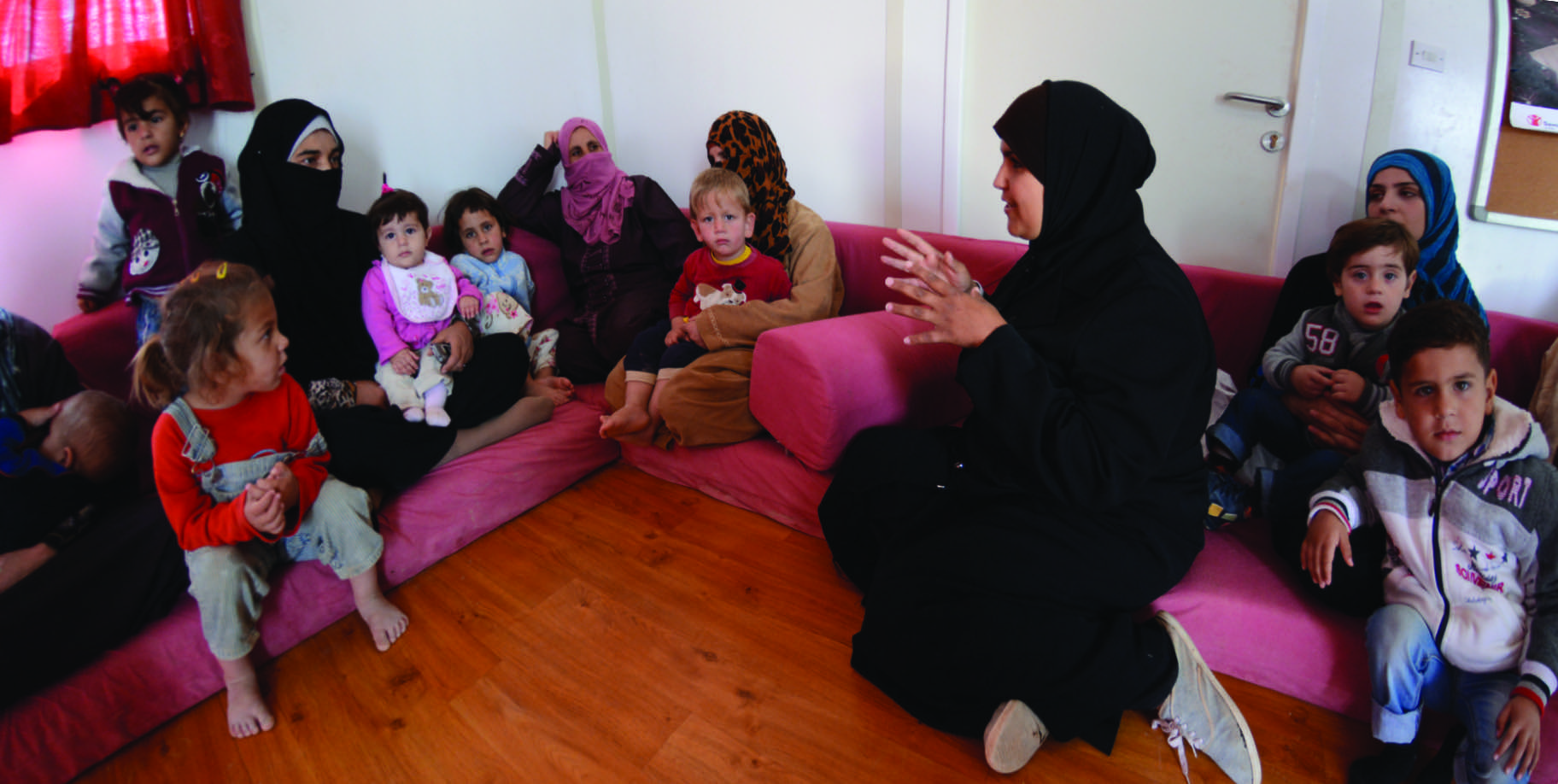 A group teaching session in the IYCF caravan