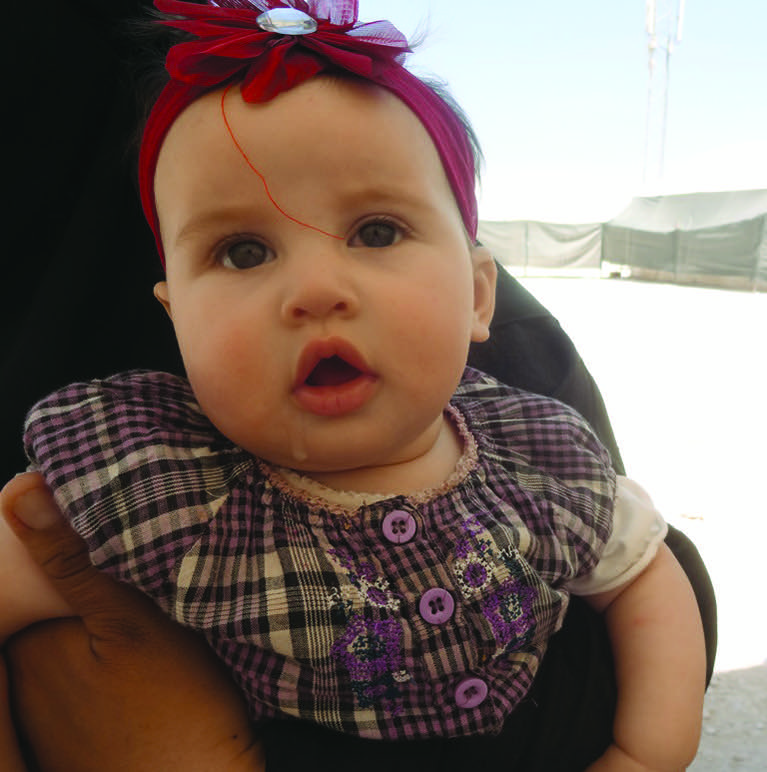 An infant in Zaatari camp in Jordan