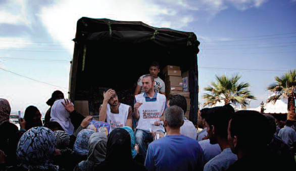 The Danish Refugee Council distributes food, hygiene kits, baby kits, blankets and cooking sets to refugees from Syria