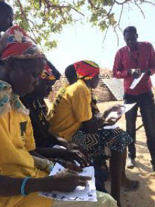 CHWs providing feedback on the register revisions