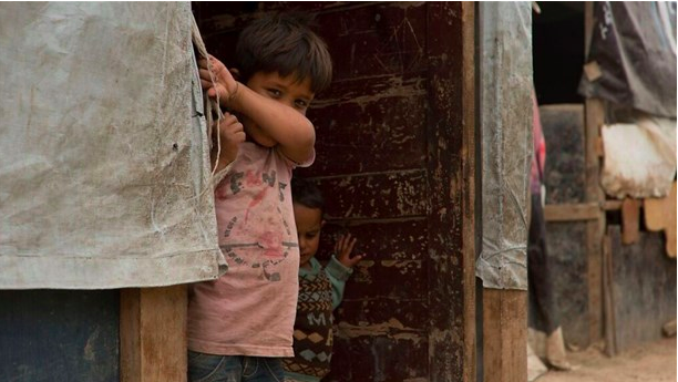 A child living in the Adams Informal Tented Settlement in Bar Alias, Bekaa Valley, Lebanon, 2017