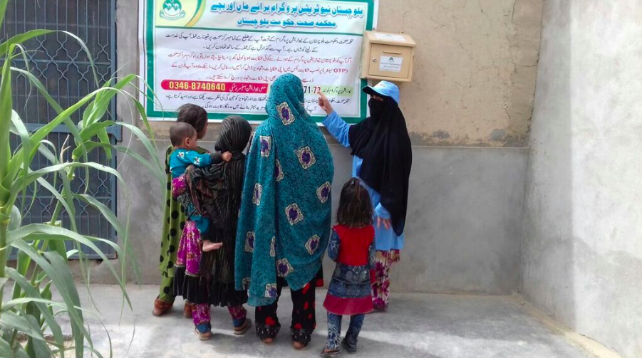Mothers learn about nutrition from trained Community Nutrition Workers
