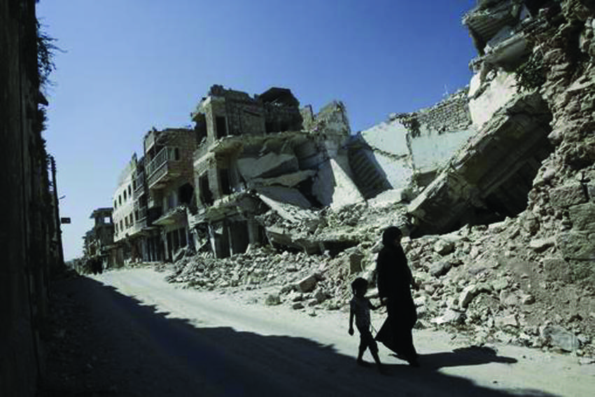 A young girl and her mother in Idlib Governorate