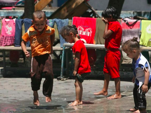 FB children play in Gaza occupied Palestinian territory 2014