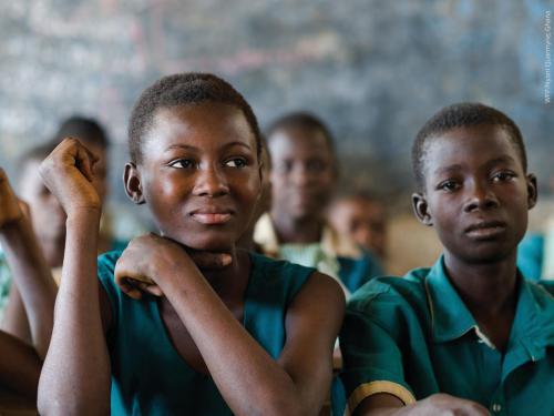 Front cover of report titled, "Adolescent Interest Group meeting 12th December 2017: Synthesis of evidence to date, key gaps and opportunities for adolescent nutrition." Image shows children in the classroom.