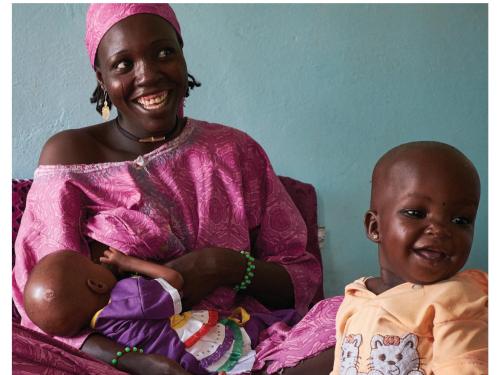 ront cover of report titled, "Making Connections: Joint meeting of WaSt Technical Interest Group and MAMI Special Interest Group." Image shows a mother sitting with her baby and other infant child.