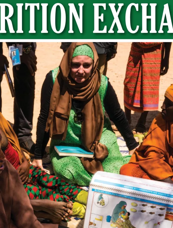 Front cover of Issue 11 English. Image shows a group of women sitting and learning about nutrition.