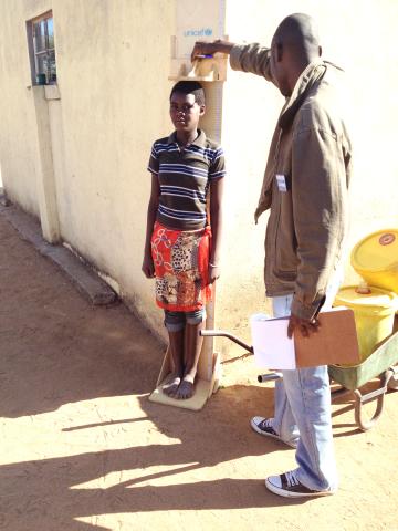 a child's height is measured