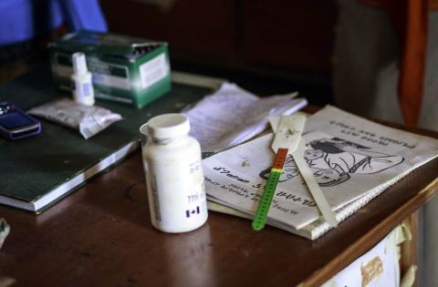 A pot of prebiotics on a medical professional's desk